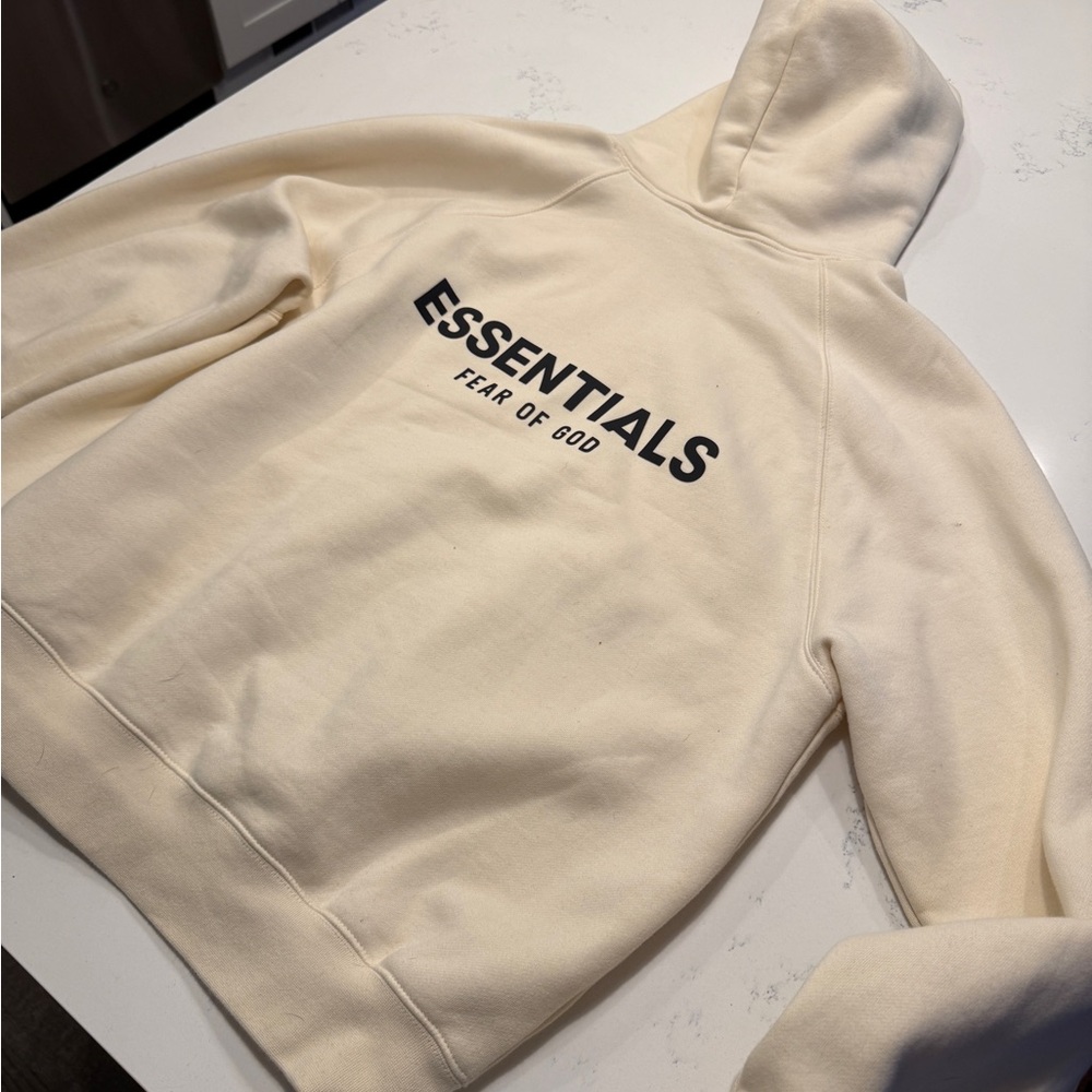 Fear of God Essentials cream pullover hoodie